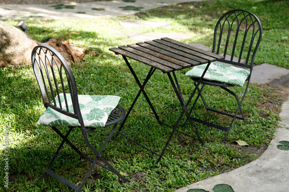 iron chair and table in the cafe garden iron chair and table in the cafe garden