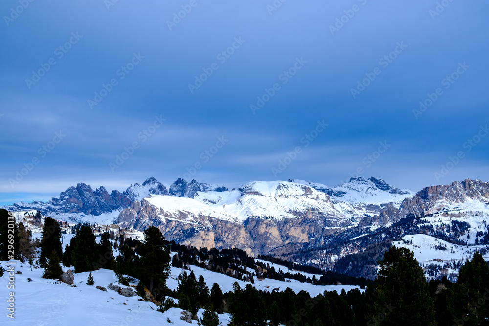 Stormy clouds in italian dolomites in a snowy winter