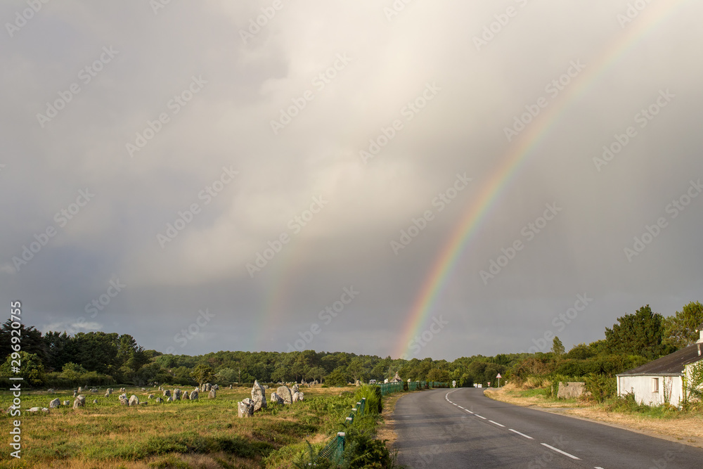 Rainbow over rows of menhirs at Carnac