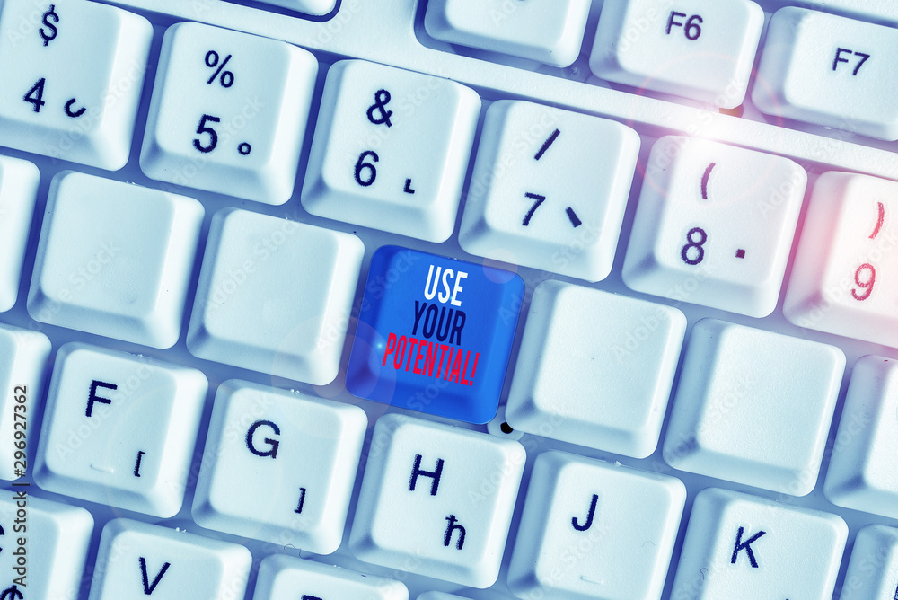 Writing note showing Use Your Potential. Business concept for achieve as much natural ability makes possible White pc keyboard with note paper above the white background Writing note showing Use Your Potential. Business concept for achieve as much natural ability makes possible White pc keyboard with note paper above the white background