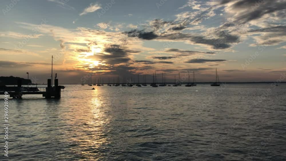 Ocean on a sunset - yachts in a harbour Ocean on a sunset - yachts in a harbour