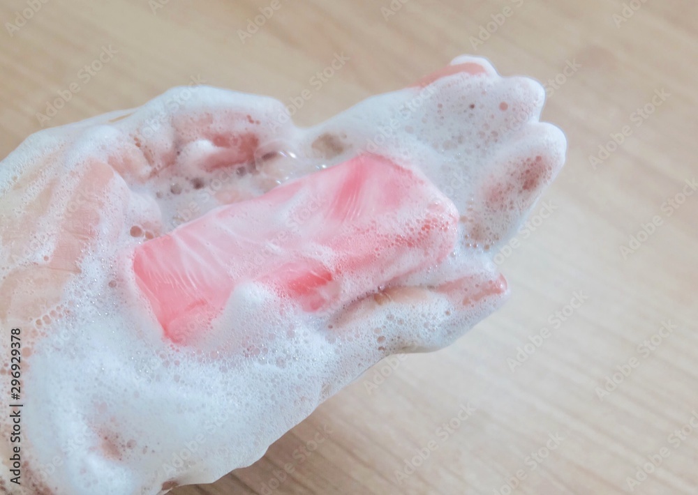 Fototapeta premium Close Up Woman Hand with Soap Bar