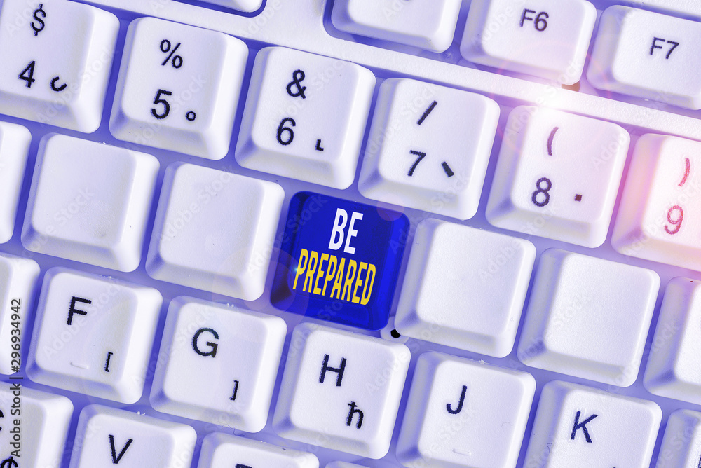 Conceptual hand writing showing Be Prepared. Concept meaning make something ready for use or consideration at future White pc keyboard with note paper above the white background Conceptual hand writing showing Be Prepared. Concept meaning make something ready for use or consideration at future White pc keyboard with note paper above the white background