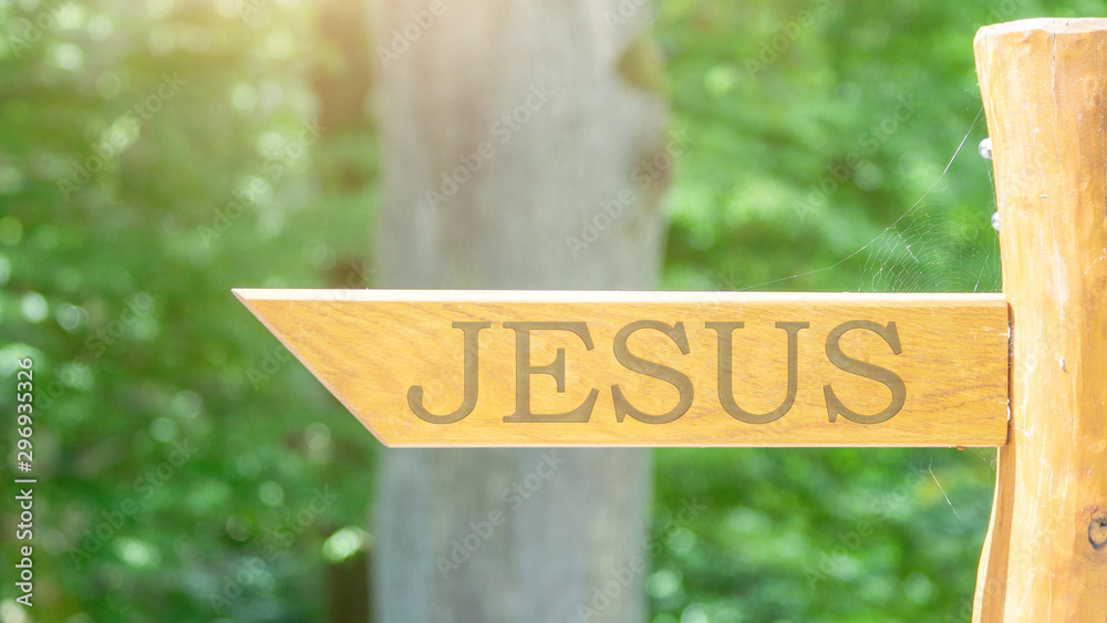 Jesus - wooden signpost with an arrow