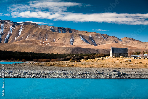 crystal blue water in front of the Church of the Good Shepard New Zealand