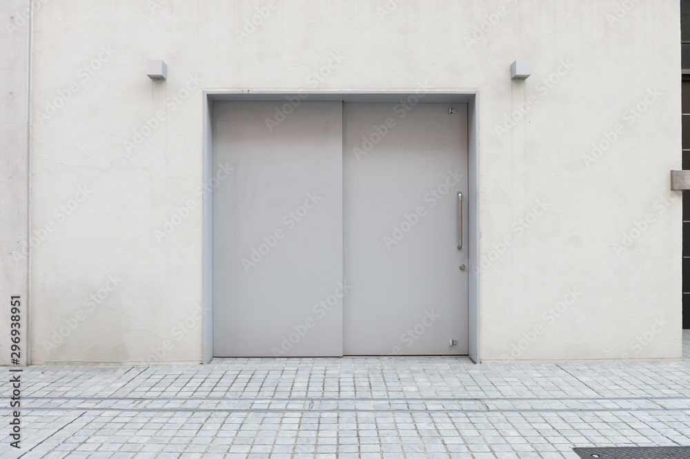 sidewalk by street wall & door sidewalk by street wall & door