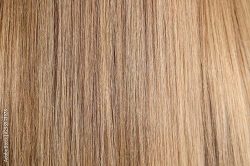 background of female brown hair close up