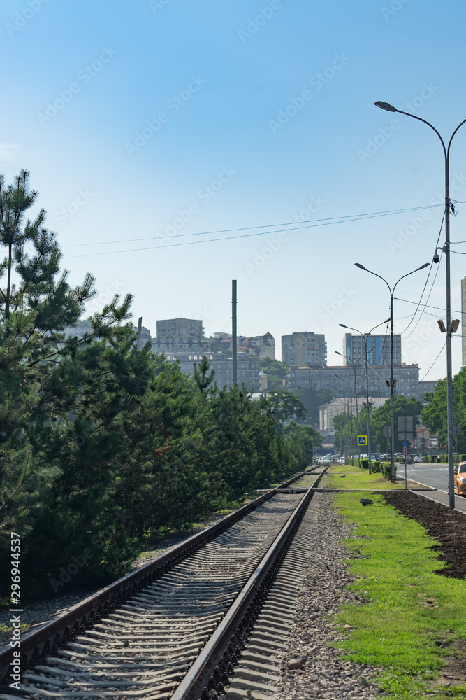 Fototapeta premium City skyline with the railway on the street.