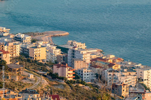 Sunset elevated view taken in the golden hour of a calm spring evening, Saranda, Albania, residential quarter