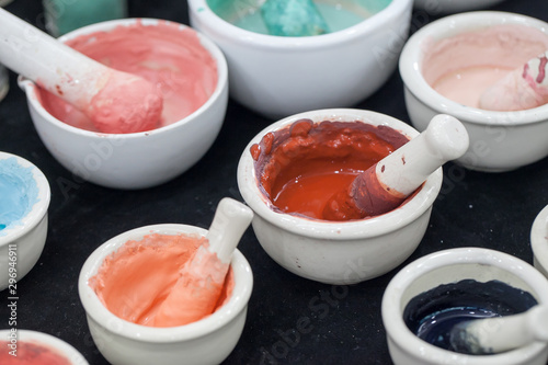 фотографія Raw organic powder of natural dyes colour in white bowl.