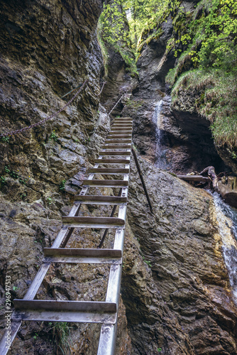 Metal ladder next to Misove Waterfalls on a Sucha Bela famous hiking trail in park called Slovak Paradise, Slovakia