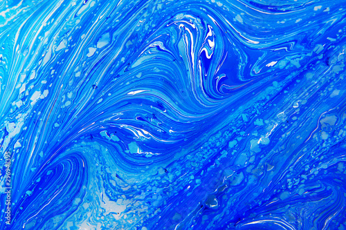 Abstract painting technique Ebru .Turkish style Ebru on the water with acrylic paints press waves.Modern art marble liquid texture