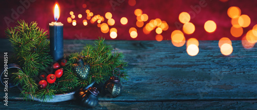 Background with candle and christmas ornaments