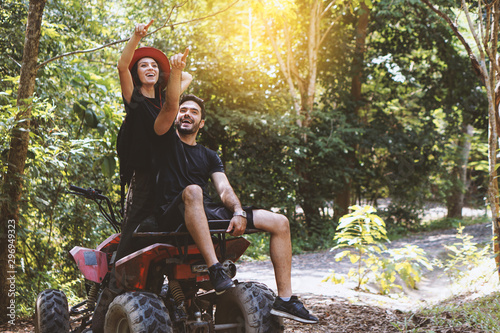 Adventure to the jungle on ATV with lover, best friend concept
