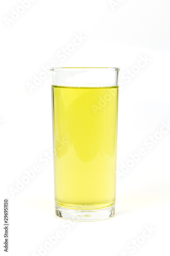 Sugarcane juice in glass isolated on white background.