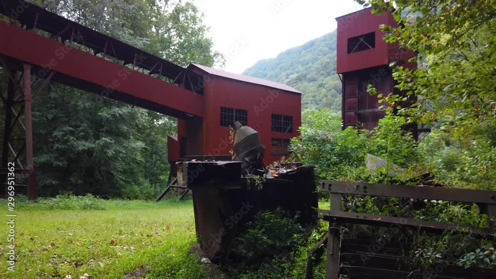 Wide shot of the Nuttallburg coal conveyor and tipple in New River Gorge National Park in Fayetteville, West Virginia. Wide shot of the Nuttallburg coal conveyor and tipple in New River Gorge National Park in Fayetteville, West Virginia.