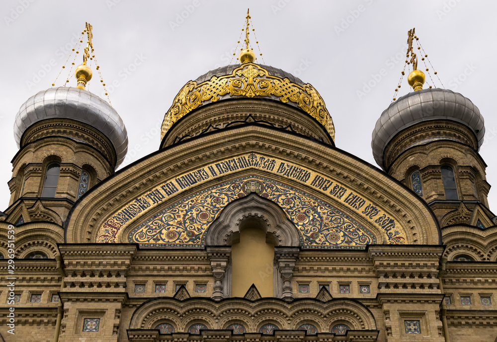 Obraz premium The orthodox Church of the Dormition of the Mother of God stands towering on the Vasilievsky Island in Saint Petersburg, Russia