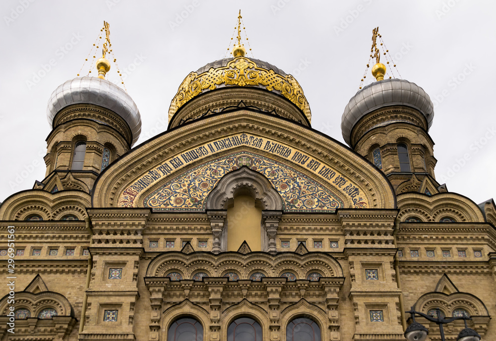 Fototapeta premium The orthodox Church of the Dormition of the Mother of God stands towering on the Vasilievsky Island in Saint Petersburg, Russia