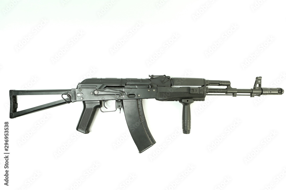 Black machine gun with handle on a white background with copy space Black machine gun with handle on a white background with copy space