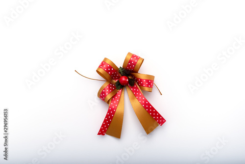 Ribbon bow, used for decorating Christmas or New Year Isolated on white background © Anucha