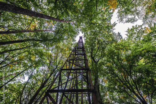 Rusty beacon light tower, remains of airport in Wrzeszcz area of Gdansk city in Poland photo