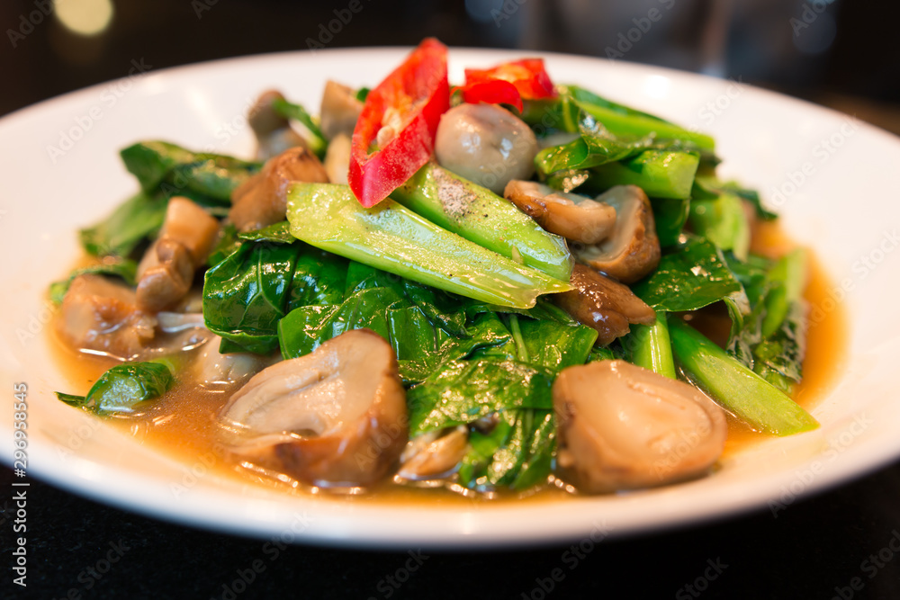 Fried Chinese kale With oyster sauce and mushroom Fried Chinese kale With oyster sauce and mushroom