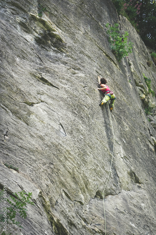 rock climbing woman hiking Dolomities