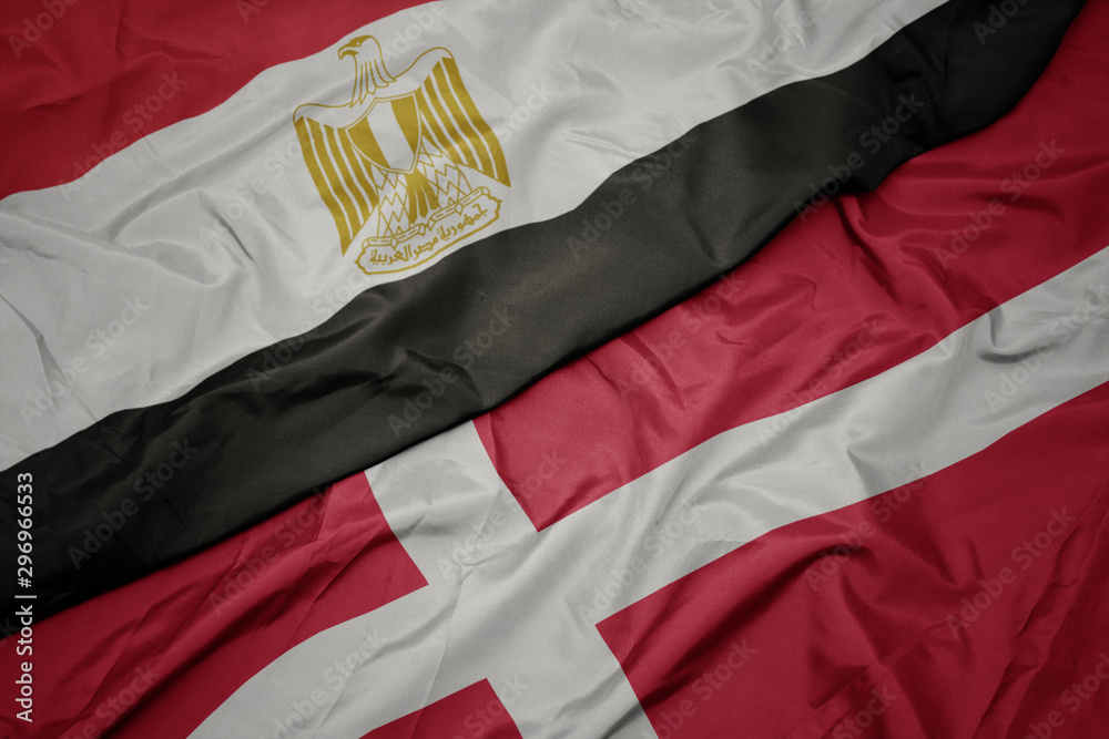 waving colorful flag of denmark and national flag of egypt . waving colorful flag of denmark and national flag of egypt .