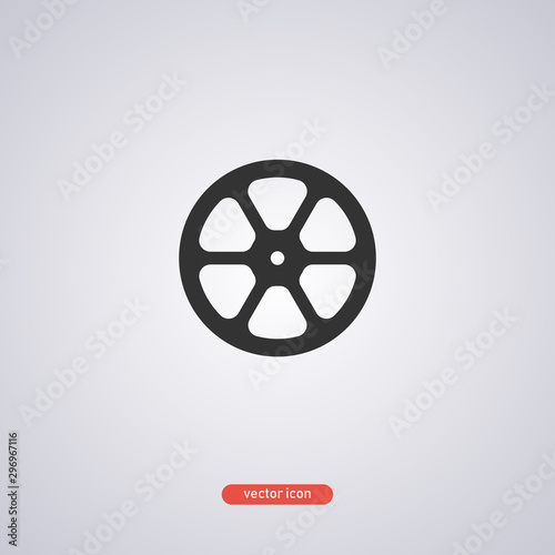 Black film reel icon in a flat style isolated on gray background. Vector illustration.