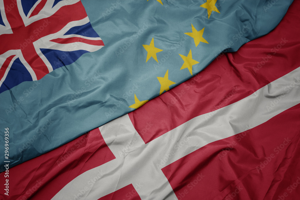 waving colorful flag of denmark and national flag of Tuvalu . waving colorful flag of denmark and national flag of Tuvalu .