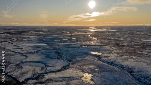 Winter Landscape of the forest-tundra  river bank  bird s eye view.Arctic Circle  tundra. Beautiful landscape of tundra from a helicopter.