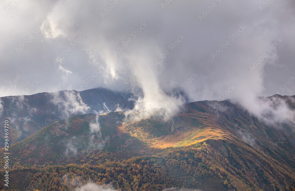 The Sun and Clouds in Mountains