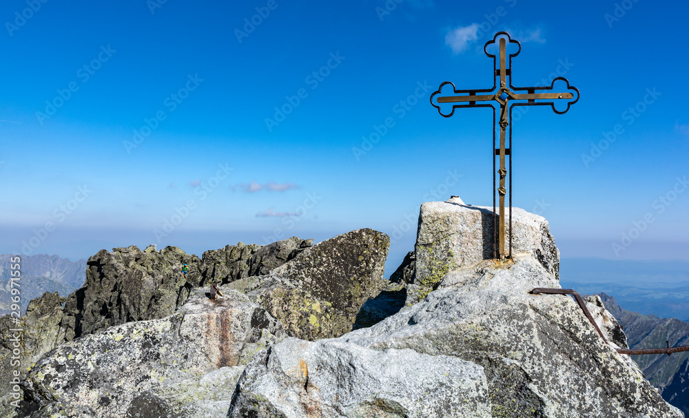 Cross on the highest peak (Gerlachov Peak, Gerlachovsky stit, Gerlach) of the Tatra Mountains. Mountain guides often lead their clients here.