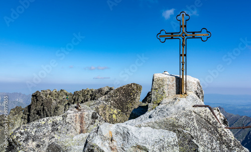 Cross on the highest peak (Gerlachov Peak, Gerlachovsky stit, Gerlach) of the Tatra Mountains. Mountain guides often lead their clients here.