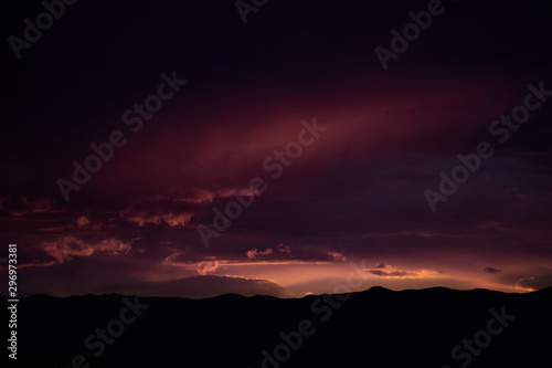 Beautiful sunset sky, purple, pink, red and orange colors © Savory