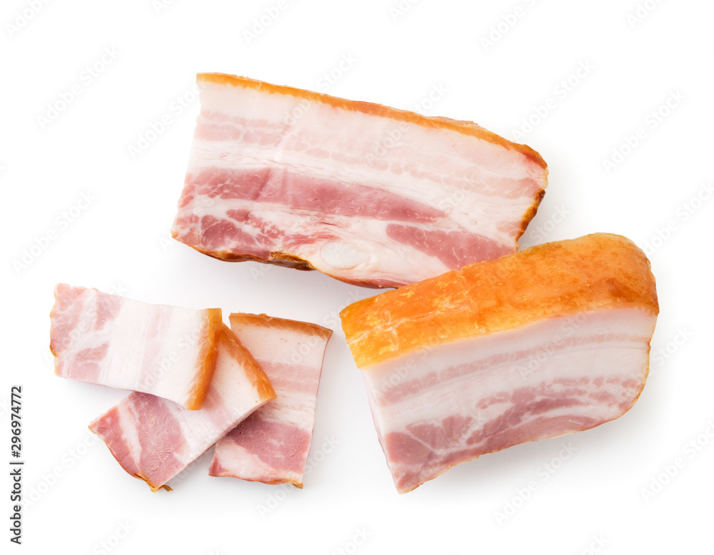 Two pieces of smoked neck and sliced slices on a white. The view of the top. Two pieces of smoked neck and sliced slices on a white. The view of the top.