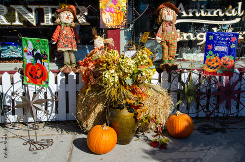 Fall and Halloween decorations at a store front in Southport North Carolina.