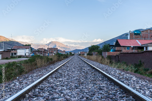  train tracks with distant mountains