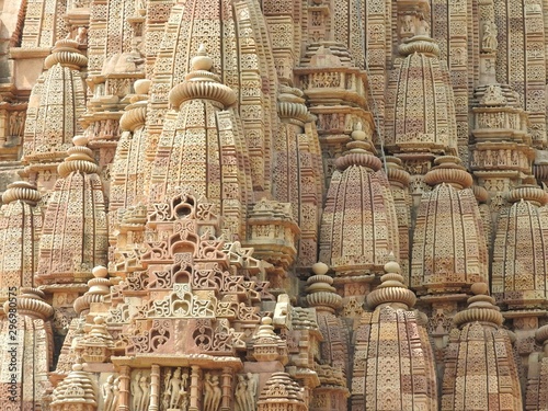 Sex poses from the kamasutra, erotic close - up of intricate carved scenes on the walls of Hindu temples in the Western group of Khajuraho, India