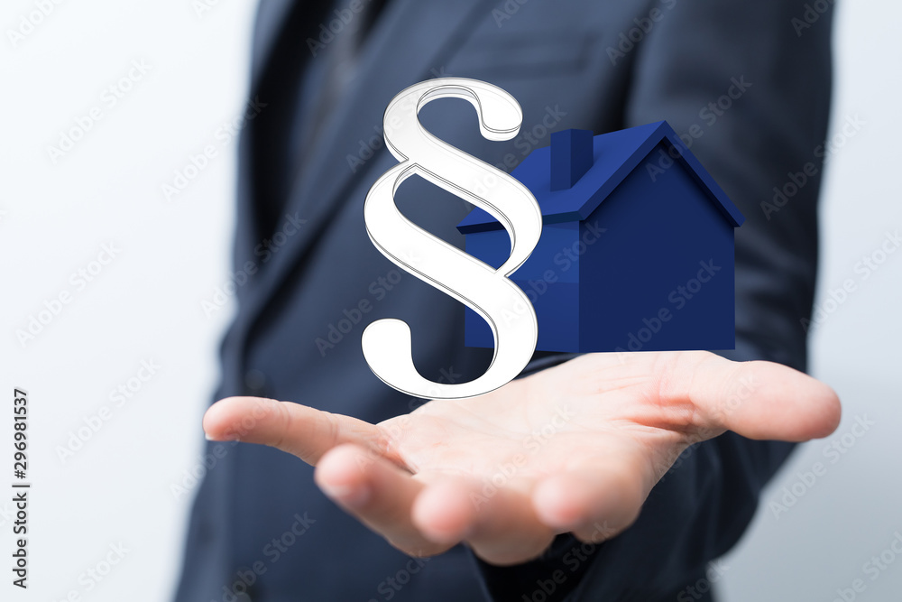 law house contract in hand