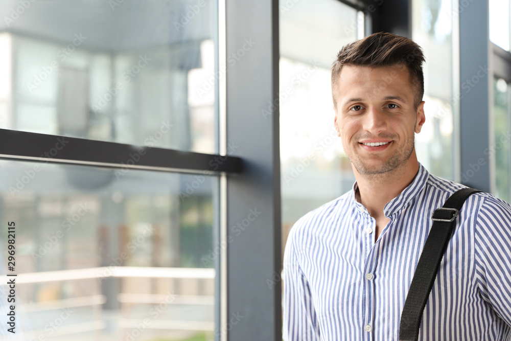 Portrait of male business trainer in office wear indoors Portrait of male business trainer in office wear indoors