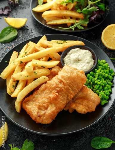 Photography British Traditional Fish and chips with mashed peas, tartar sauce and cold beer