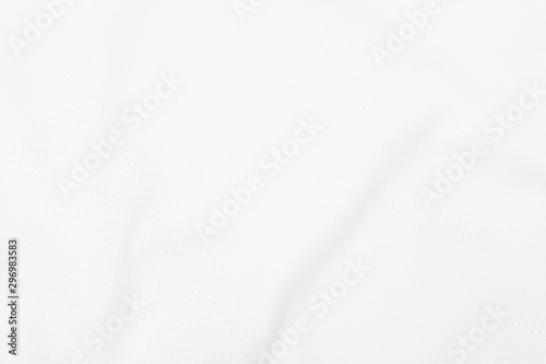 White fabric texture background with soft waves.