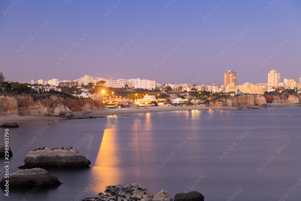 Sunset over the city of Algarve, Portugal.