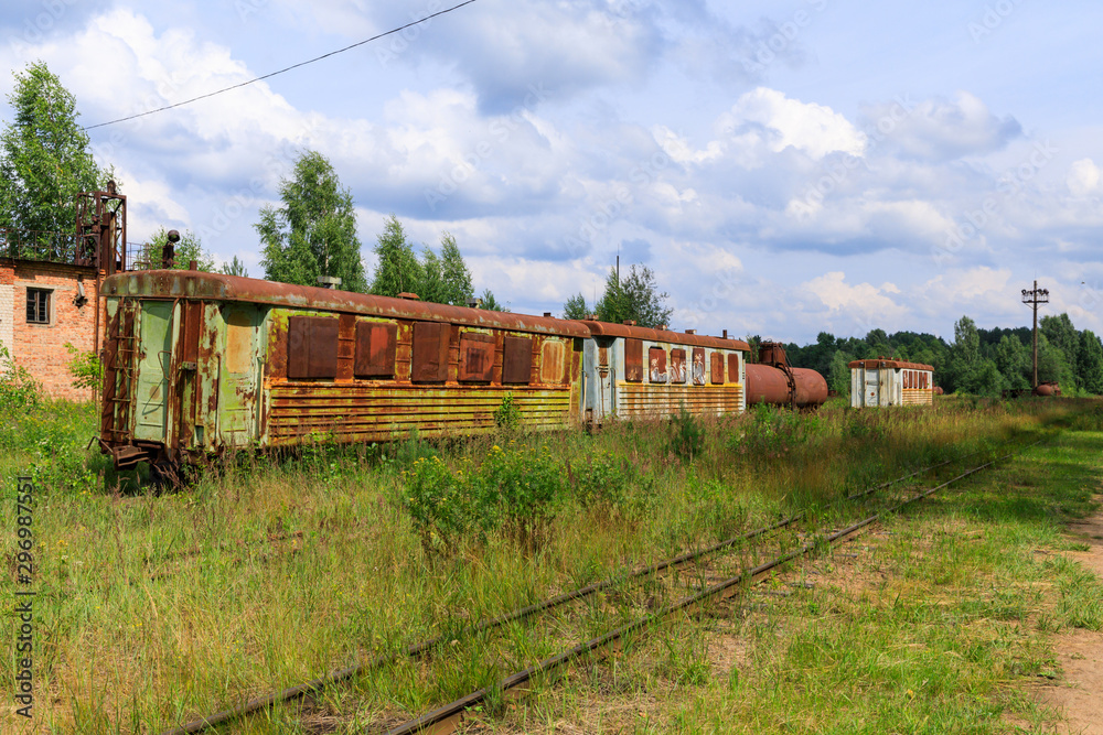 abandoned narrow gauge railway, Branches of the railway at the marshalling yard, forest and lonely road in the middle Russia