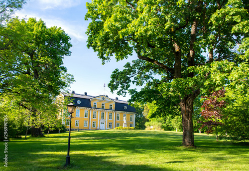 Beautiful view of Mustion Linna manor and park in summer, Finland