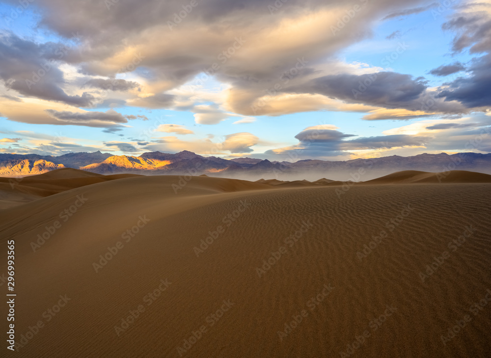 Sunset over sand dunes