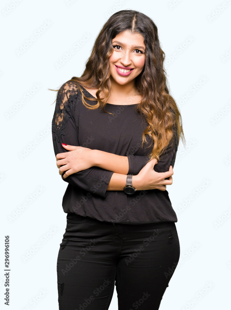 Beautiful young woman with long hair happy face smiling with crossed arms looking at the camera. Positive person. Beautiful young woman with long hair happy face smiling with crossed arms looking at the camera. Positive person.
