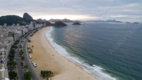 Early morning view over the copacabana in Rio de Janeiro, Brazil, around sunrise on a cloudy day captured with a drone