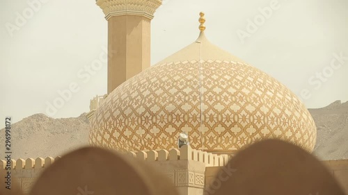 Nizwa Fort, Oman. Traditional Omani fortress, general plan and details. Panorama of the minaret